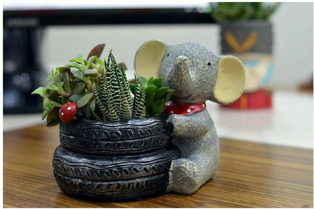 Cute Baby Elephant Tyre Holding Resin Pots
